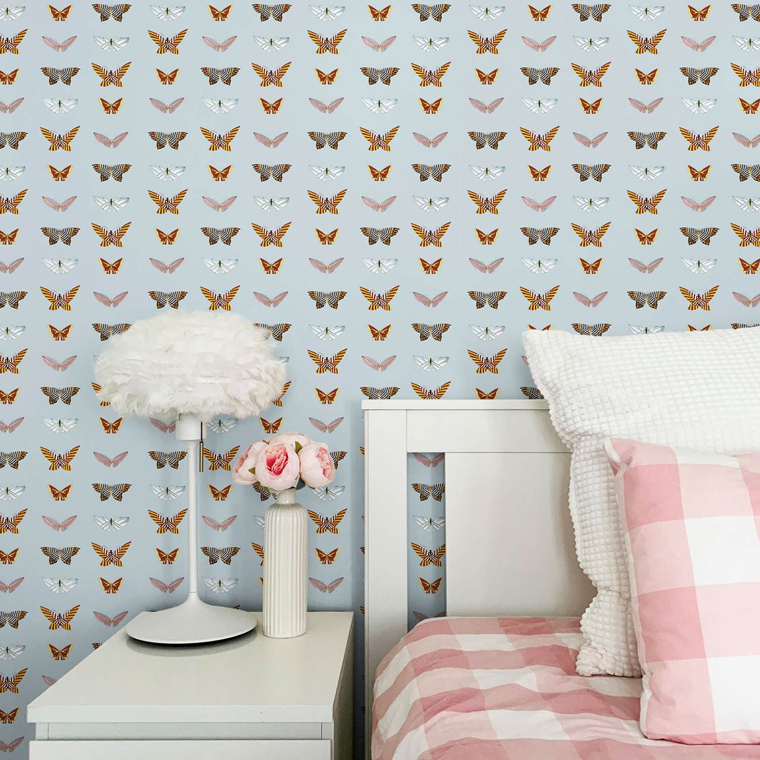 Colorful vintage butterfly design wallpaper with pastel blue background in pink girls room wallpaper