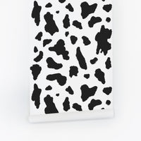 Modern cow print wallpaper available as peel and stick wallpaper and classic wallpaper