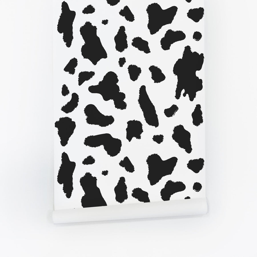 Modern cow print wallpaper available as peel and stick wallpaper and classic wallpaper