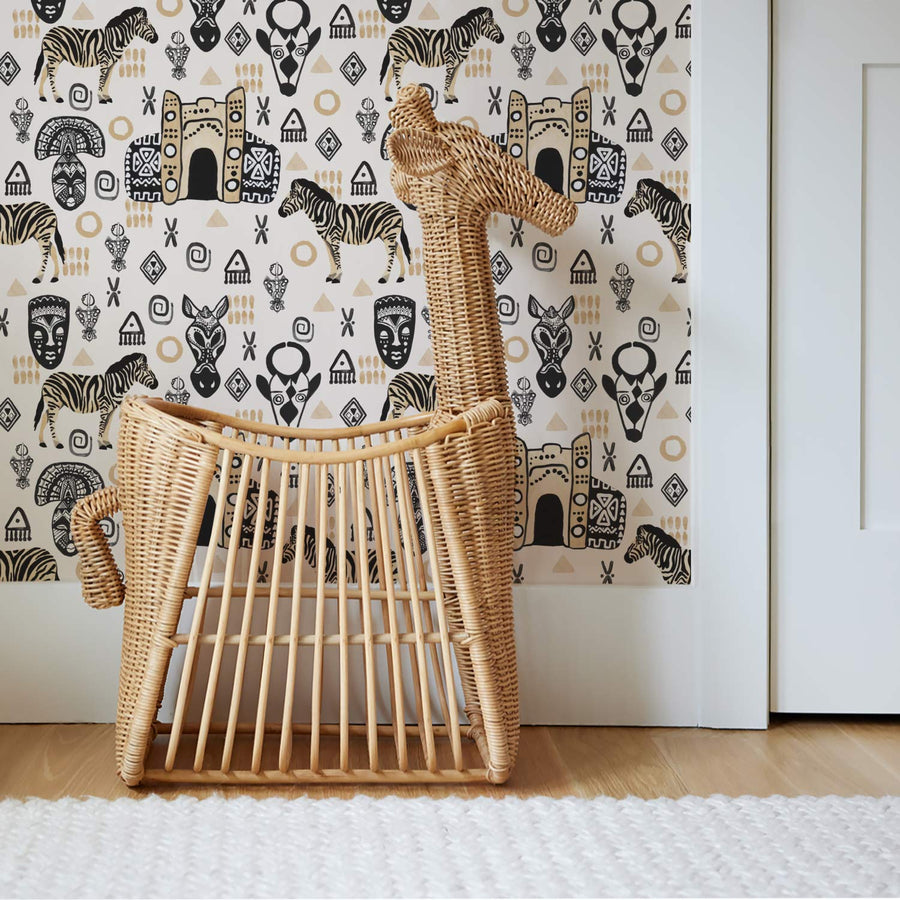 black and white african wallpaper in cute nursery interior