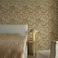neutral style bedroom interior with bold and eclectic removable wallpaper