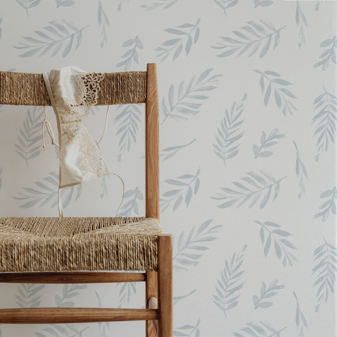 Soft blue leaves design removable wallpaper for boho style bedroom interiors