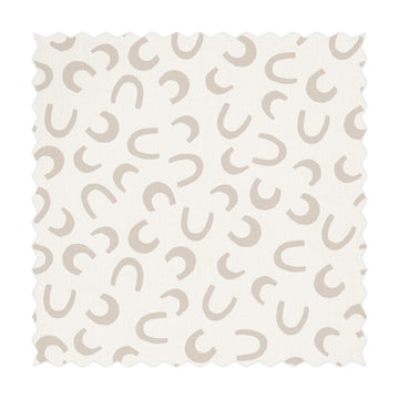beige color fabric with tiny horseshoe prints