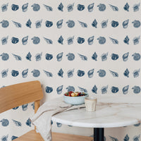 navy blue seashell pattern wallpaper for a costal home interior