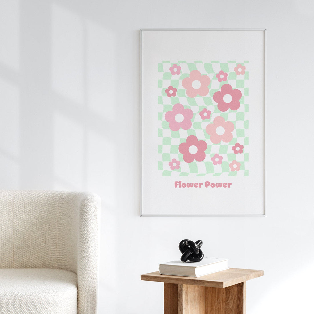 checkered art print with pink flower design