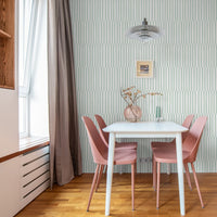 mint green minimal vertical lines wallpaper in dining room