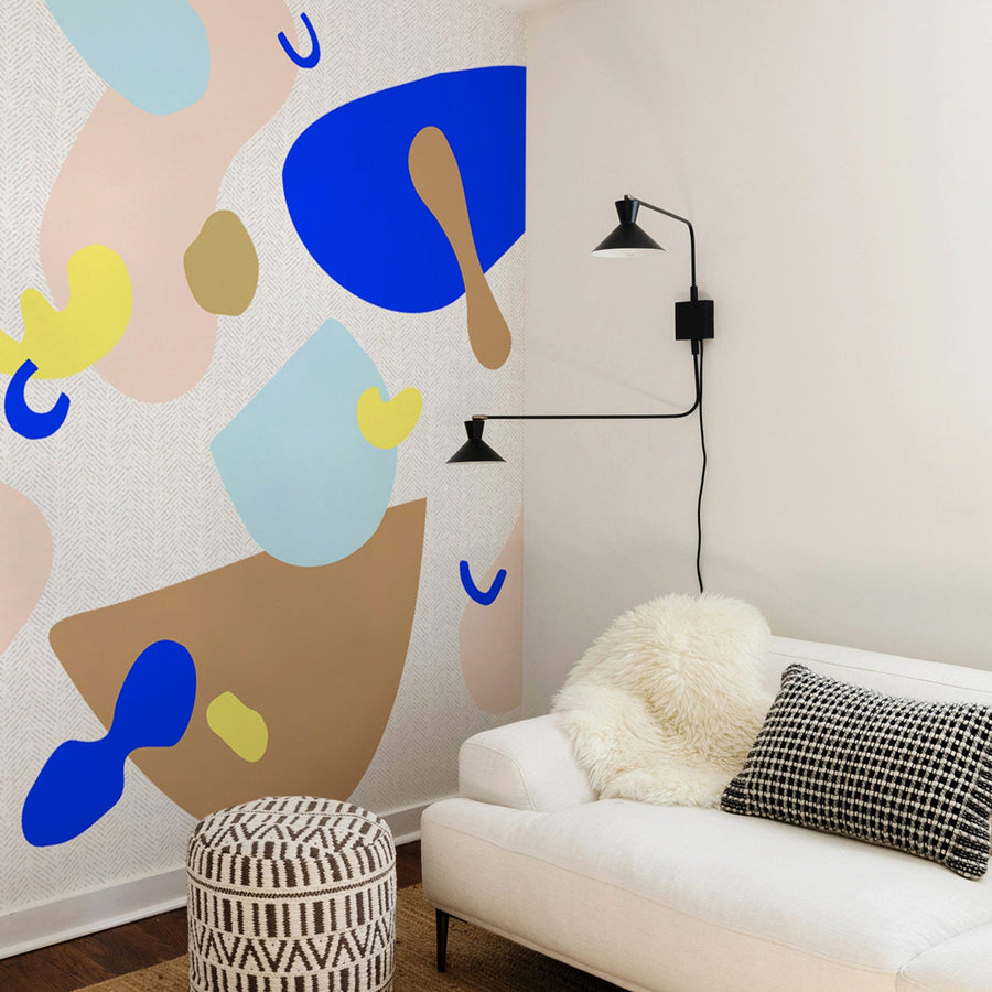 bright geometric shapes over herringbone print wall mural for scandinavian style living room interiors