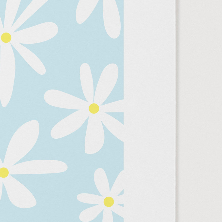 close up of blue and white daisy design poster