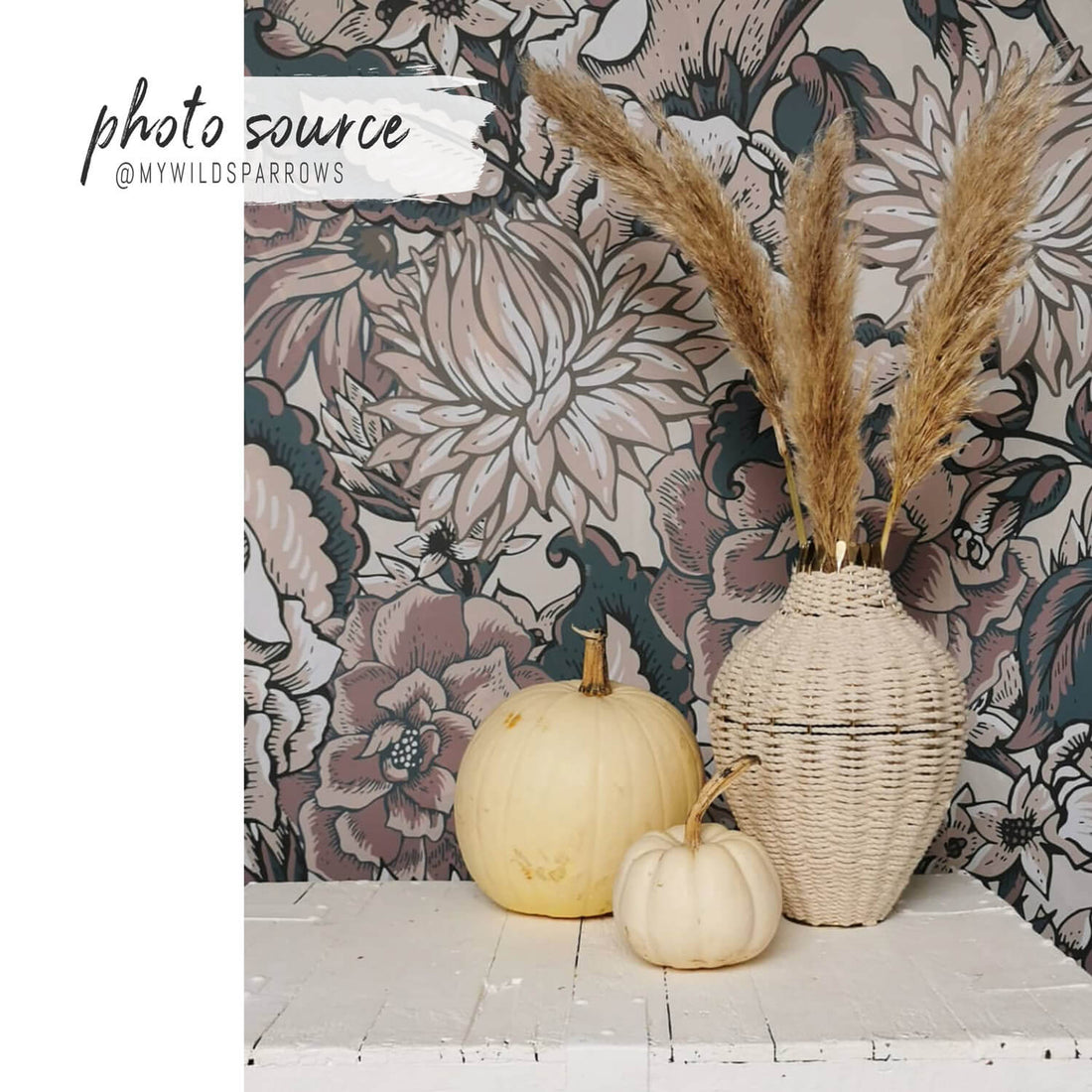 Pink paisley print removable wallpaper in bohemian home interior setting with pampas grass and pumpkin decors
