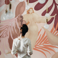 Nude wall mural of female figure in pink and red color palette