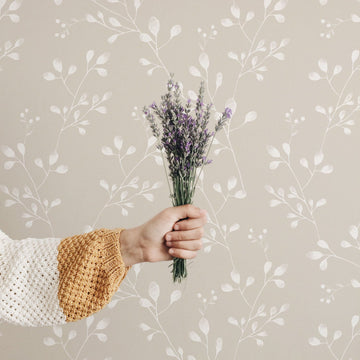 Neutral color floral removable wallpaper in boho girl's bedroom interior
