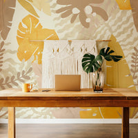 Neutral color palette jungle wall mural in minimal boho office interior