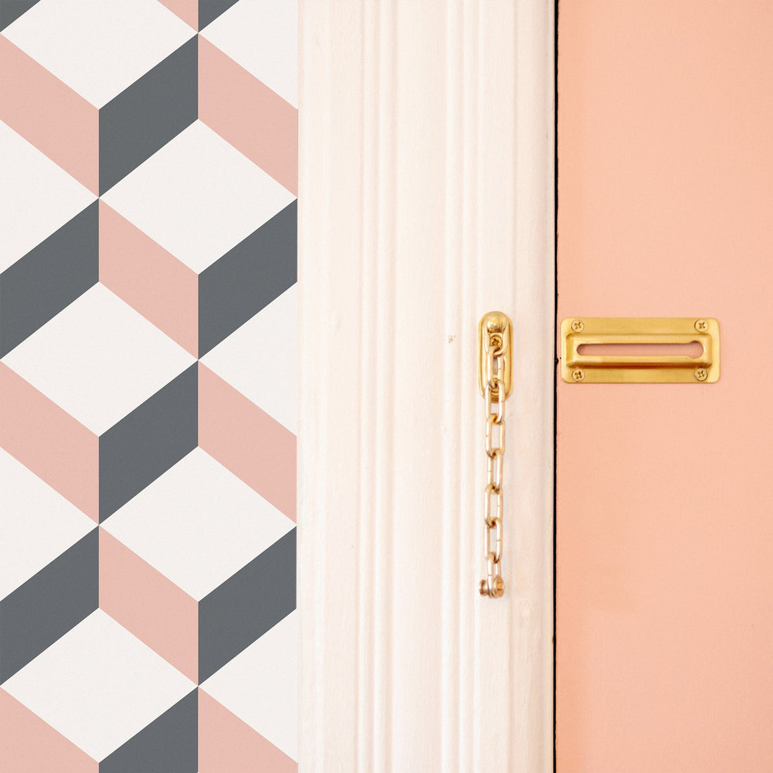 Modern cube design removable wallpaper in pink and grey colors for eclectic boho style entryway interior