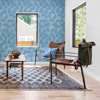 palm leaf design wallpaper in blue for living room