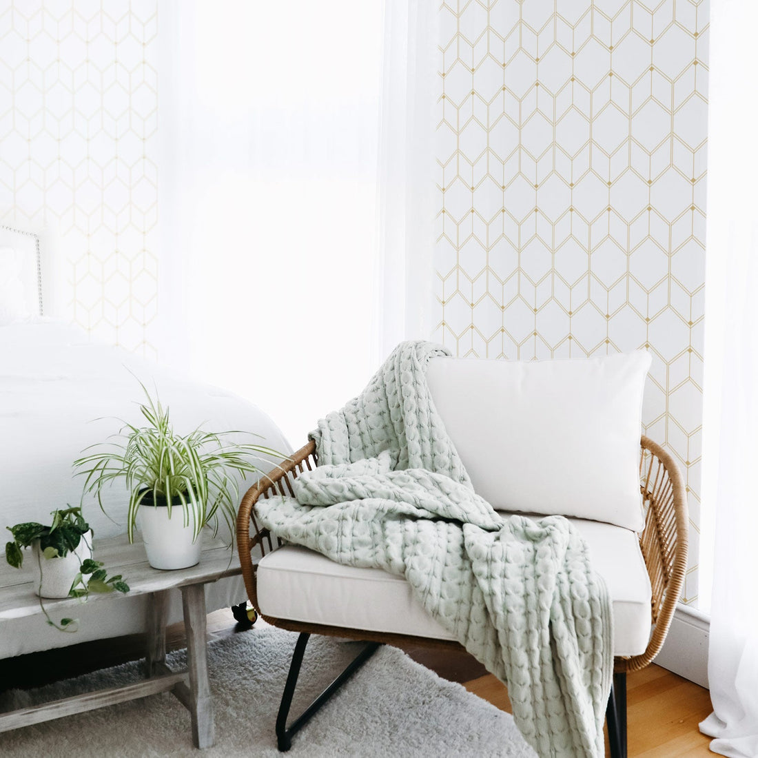 Faux gold color geometric design removable wallpaper in white boho bedroom interior