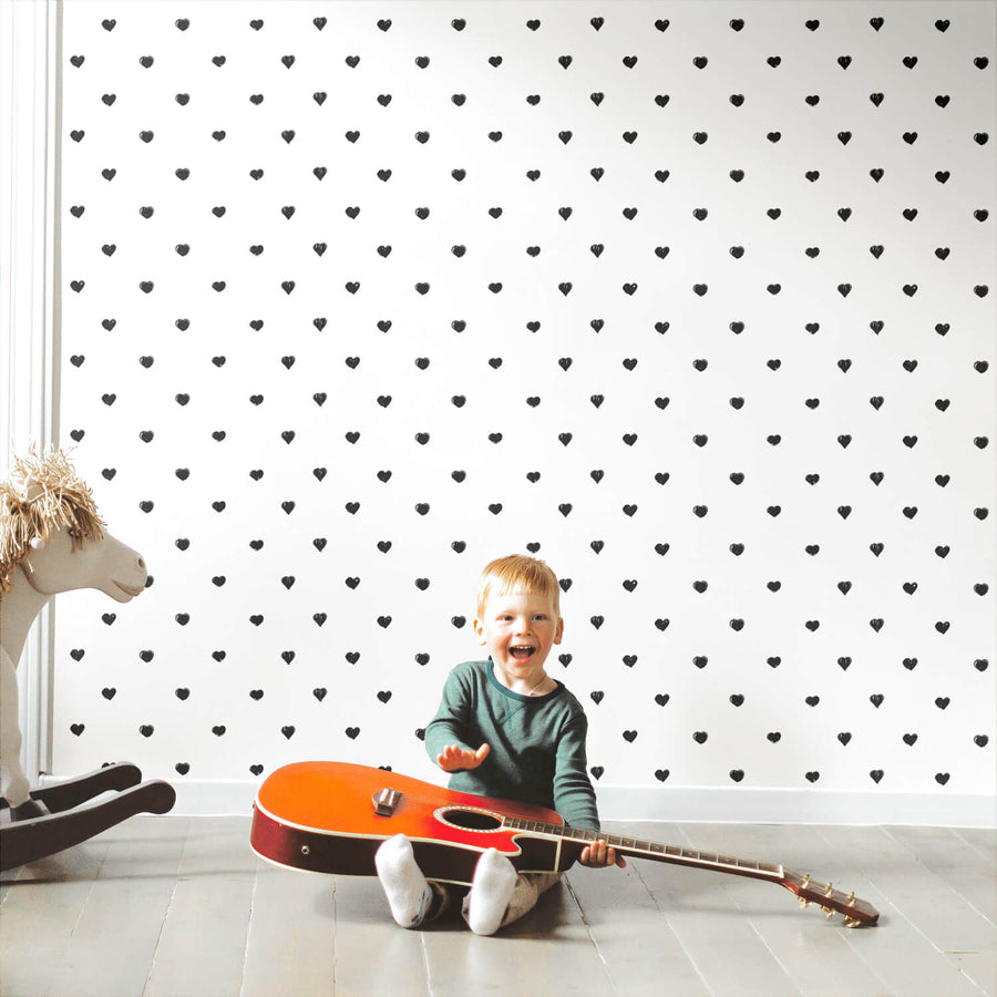 tiny black painted hearts print wallpaper for kids playroom