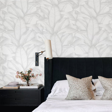 bedroom wallpaper with banana leaves in light grey