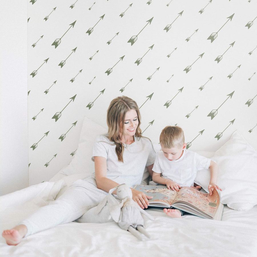 minimal arrow print wallpaper design in green for kids bedroom