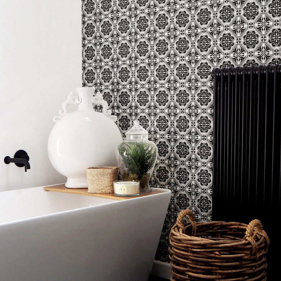 modern boho farmhouse bathroom with woven baskets and black moroccan wallpaper