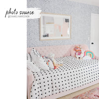 modern pink girls bedroom with dotted wallpaper in grey