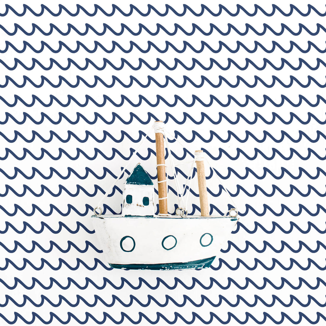 blue waves inspired nautical wallpaper for coastal style kids bedroom