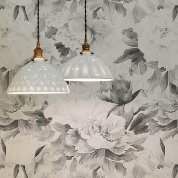 Grey watercolor peonies removable wallpaper in boho style home office interior with white and gold chandeliers